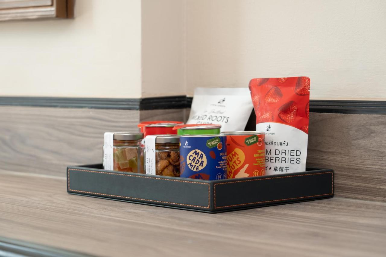 Nh Bangkok Sukhumvit Boulevard Exteriör bild A selection of snacks at a hotel